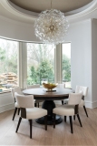 modern-breakfast-nook-round-table-glass-chandelier