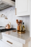 modern-kitchen-cooktop-pot-filler-brass-hardware