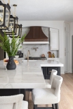 modern-kitchen-waterfall-island-copper-range-hood